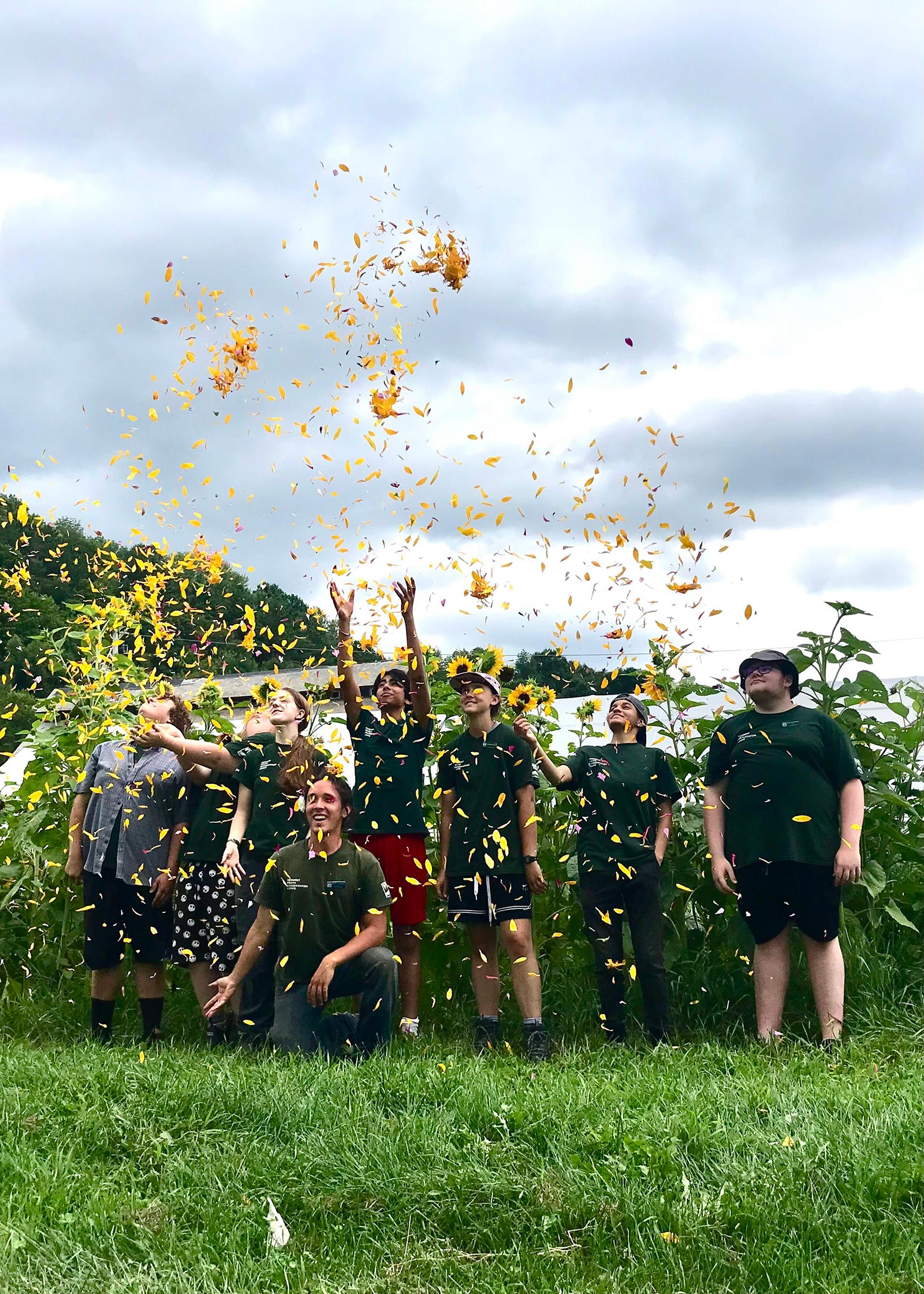 Nathan, front, and the youth crew he led this summer, had a lot to celebrate: growing food for their community, learning to cook, earning wages and building skills.